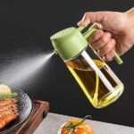 2-in-1 oil spray bottle with adjustable mist and pour function. Leak-proof glass design, perfect for cooking, BBQ, baking, and air fryer use.